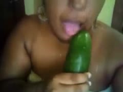 A chubby Colombian nympho uses cucumber to bonk her big fur pie.